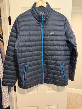 Patagonia Men's Navy Puffer Jacket with Bright Blue Zipper Accents